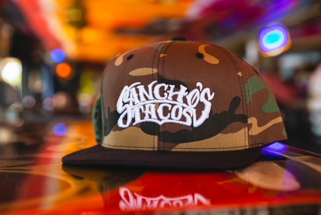 Camo Sancho's Tacos Hat with Black Bill and White Stitch